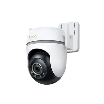 TP-Link Tapo TC43 outdoor security camera with pan and tilt. Shows a wide outdoor view in vivid color, even at night with spotlights.