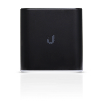 Ubiquiti UISP airCube ACB-ISP: A compact, white 2.4GHz WiFi access point with PoE passthrough, designed for home or small office internet service providers.