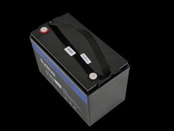 Uniross 12.8V 100Ah LiFEPO4 battery, model UR-BAT-LiFePO4-12-100. A rectangular power solution with visible terminals.