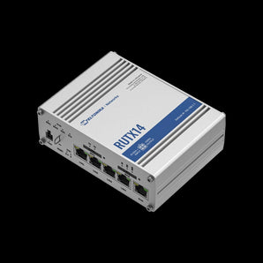 Teltonika RUTX14 industrial cellular router with antennas, dual SIM slots, Gigabit Ethernet ports, and Wi-Fi 5 for fast, reliable 4G LTE Cat 12 connectivity.
