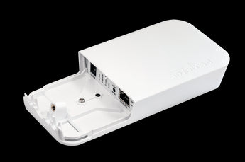 MikroTik wAP 60 Kit: Two small white wireless units for establishing a high-speed, point-to-point 60GHz wireless connection.