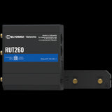 Teltonika RUT260 Industrial LTE CAT 6 Router featuring dual Ethernet ports, Wi-Fi antennas, and rugged metal enclosure for IoT applications.