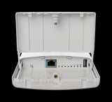MikroTik NetBox 5 ax outdoor WiFi 6 router in a weatherproof enclosure with RP-SMA connectors for flexible antenna options.