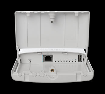 MikroTik NetBox 5 ax outdoor WiFi 6 router in a weatherproof enclosure with RP-SMA connectors for flexible antenna options.
