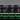 Micro Instruments MI-SNSR-ERM-6 rack mount server room environmental monitor with LCD display and sensor inputs.