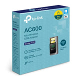 TP-Link Archer T2U: A compact, dual-band AC600 Wi-Fi USB adapter. Enhances desktop or laptop wireless connectivity. Black and silver design.
