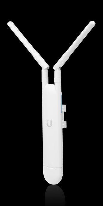 Ubiquiti UniFi AC Mesh (UAP-AC-M) access point. Compact, white, and designed for both indoor and outdoor WiFi coverage. Dual-band support.
