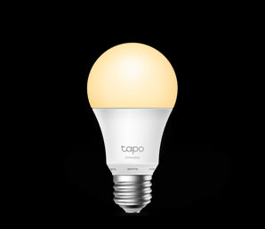 TP-Link Tapo L510E dimmable smart WiFi light bulb emitting a warm, adjustable light. Allows scheduling and remote control.