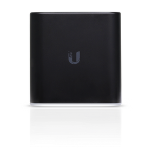 Ubiquiti UISP airCube ACB-ISP: A compact, white 2.4GHz WiFi access point with PoE passthrough, designed for home or small office internet service providers.