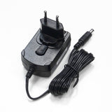 Snom 10W PSU AC power adapter for Snom desk phones. Provides power to phones when PoE isn't available. Black rectangular power supply.