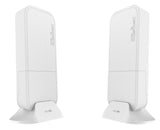 MikroTik wAP 60 Kit: Two small white wireless units for establishing a high-speed, point-to-point 60GHz wireless connection.