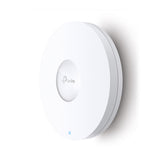TP-Link EAP610 AX1800 ceiling mount WiFi 6 access point. A white, round device for fast, reliable wireless network coverage.